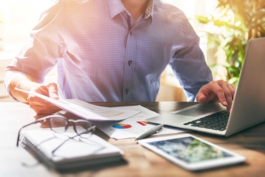 Man at office desk working on strategic business plan