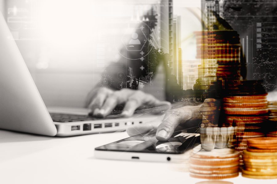 Double exposure of businessman using smart phone with blur city day and night and connection network and business concept.