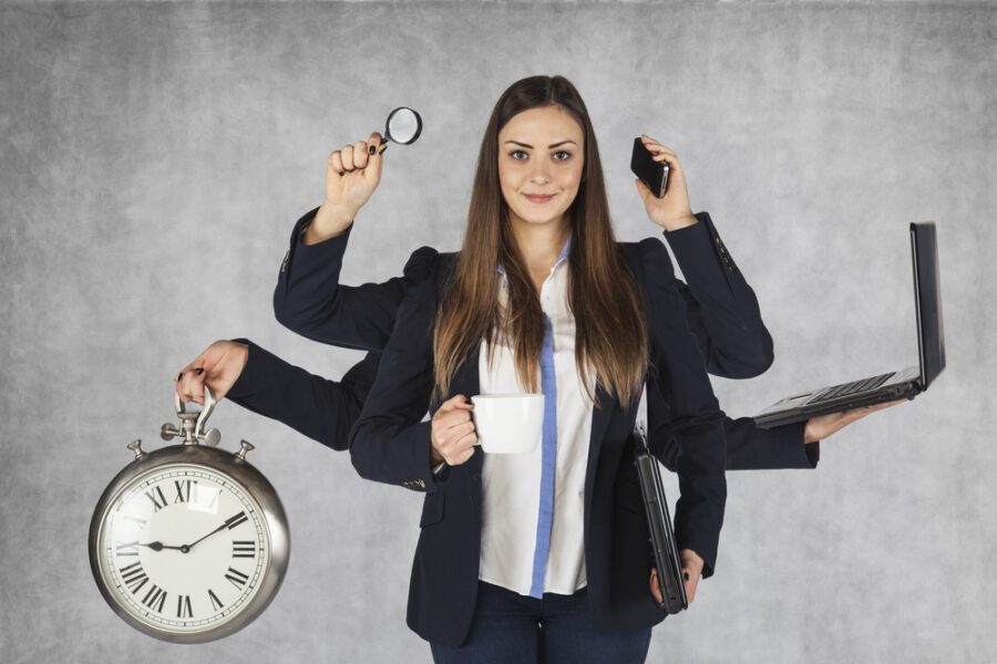 Multi-purpose businesswoman with a large number of hands