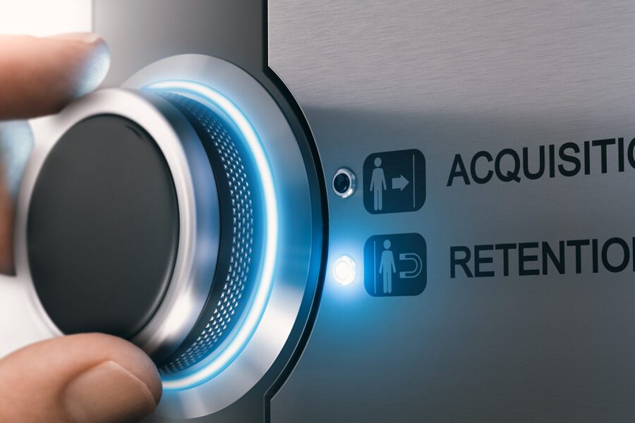 Salesperson turning a knob to select customer retention strategy instead of acquisition.